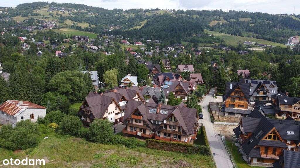 Dwu poziomowe mieszkanie z garażem geotermia-12