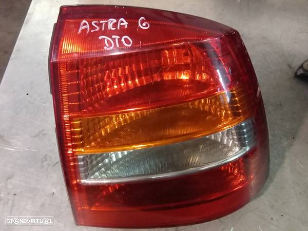 FAROLIM OPEL ASTRA G 98-03 HATCHBACK - DIREITO / ESQUERDO - 1