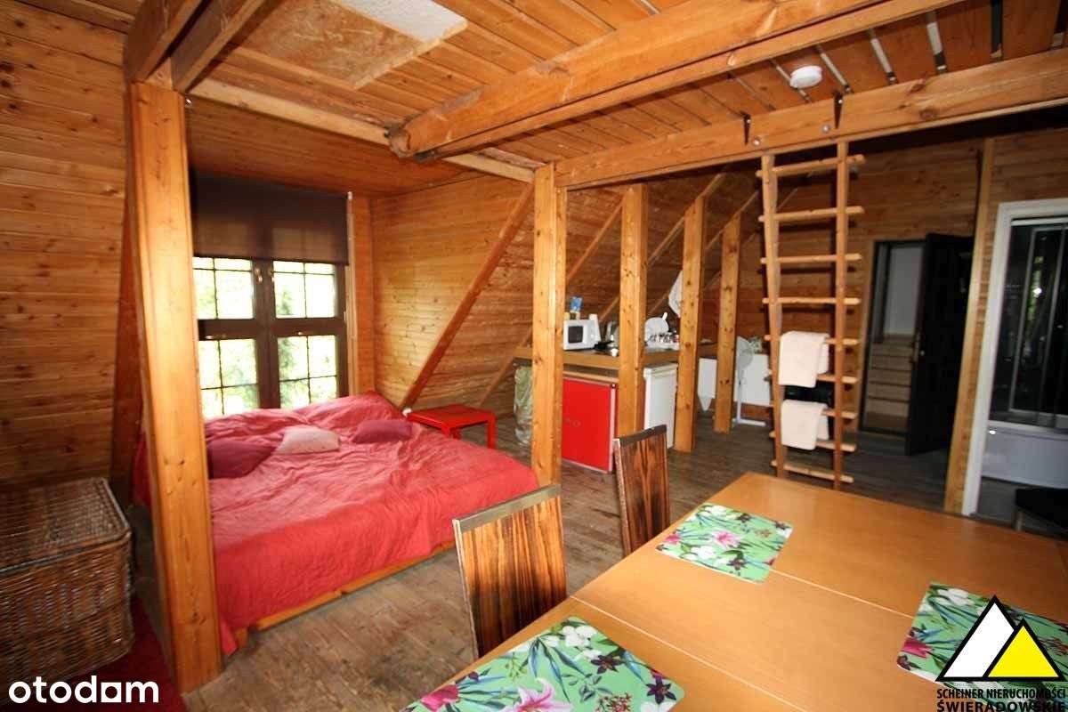 Dom z pokojami do wynajęcia i sklepem.-16