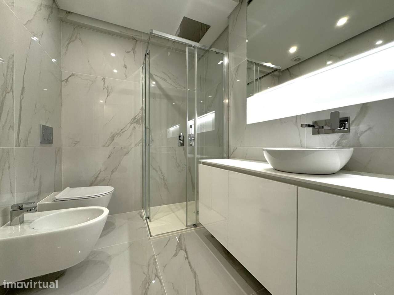 Apartamento T3 novo com estacionamento no centro de Carcavelos-33