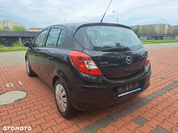 Opel Corsa 1.4 16V Enjoy - 20