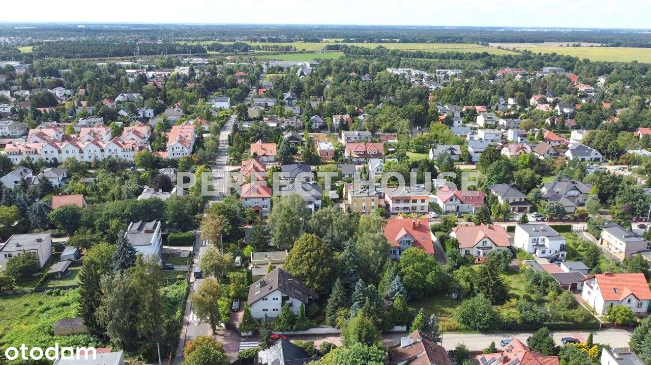 Suchy Las Dom wśród zieleni z wysokim przyziemiem-2
