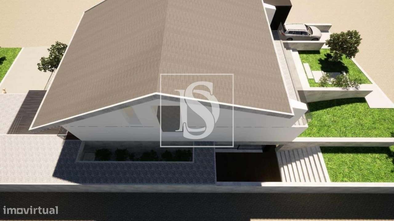 Moradia T4 de três pisos inserido num terreno com 1188m2. Exclente pot-8