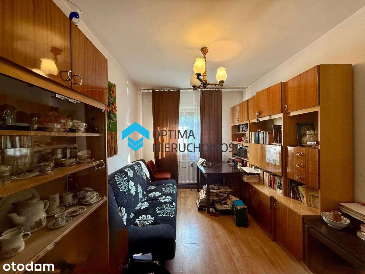 Dom z potencjałem w spokojnej dzielnicy-16