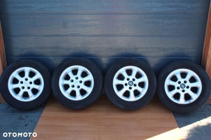 KOŁA FELGI ALUMINIOWE 15" 5x110 ET43 OPEL ZAFIRA A ASTRA H VECTRA V SIGNUM - 1