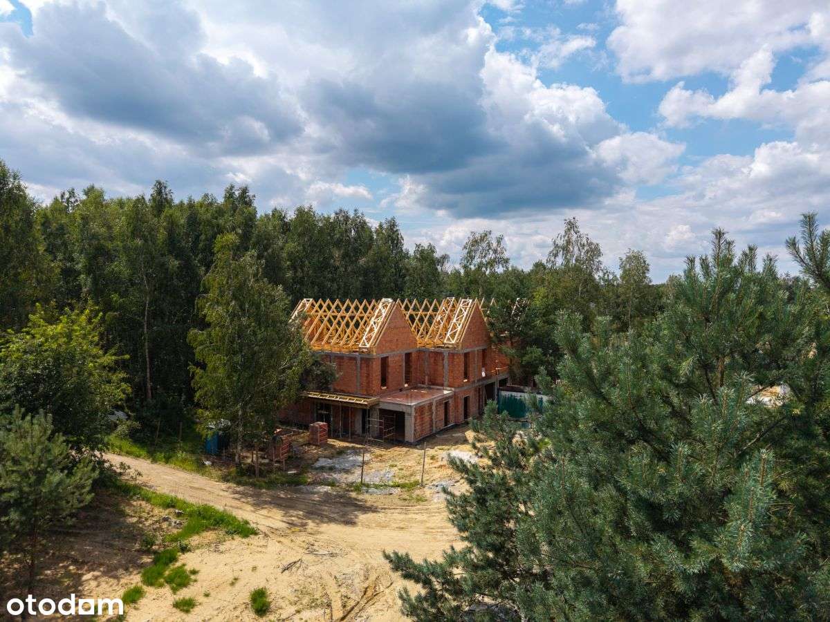 Dom z ogrodem pod Warszawą – nowoczesna inwestycja-0