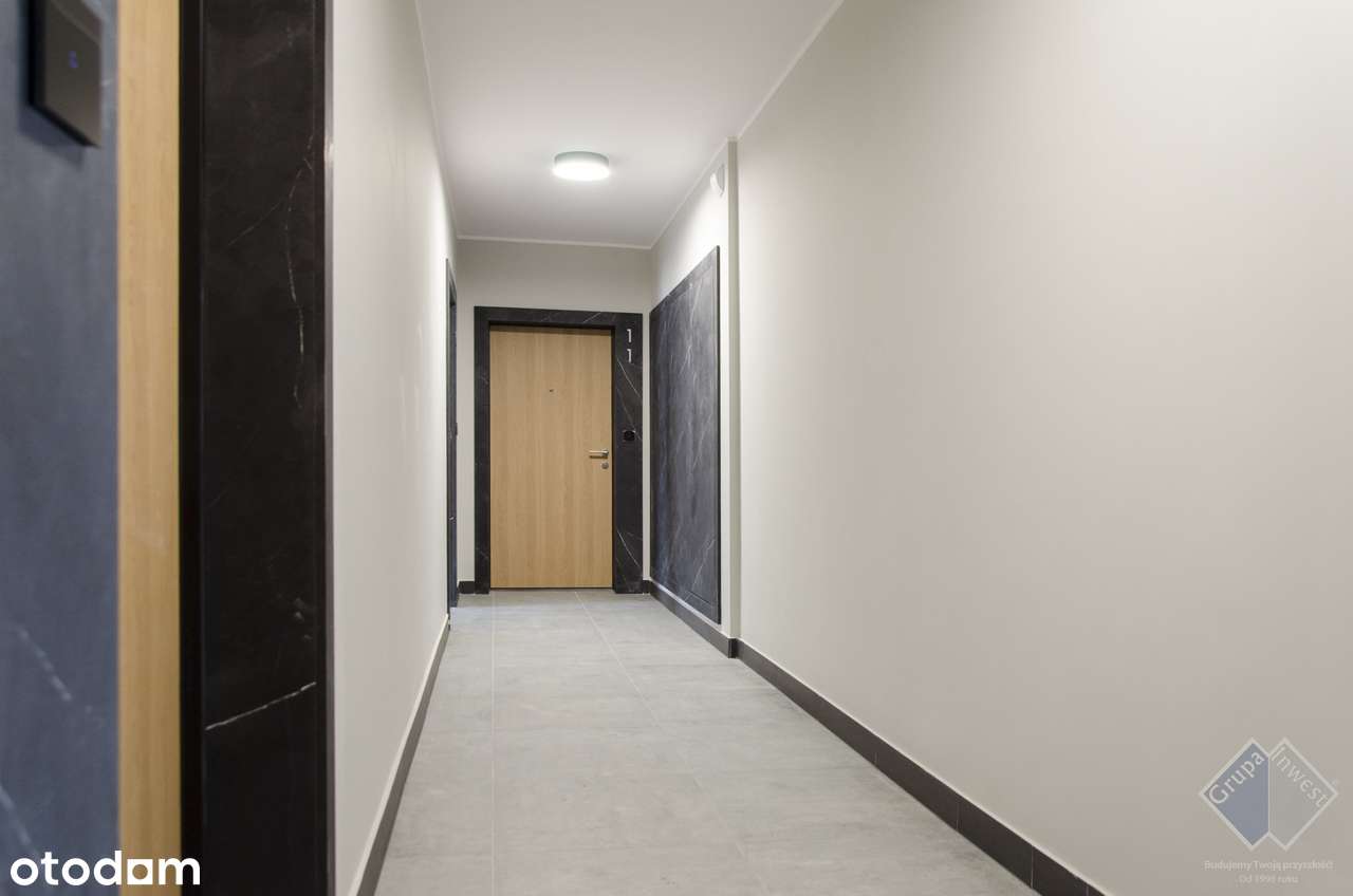 Z widokiem na zadrzewienie! Dwupoziomowe mieszkanie Jasielska Poznań-11