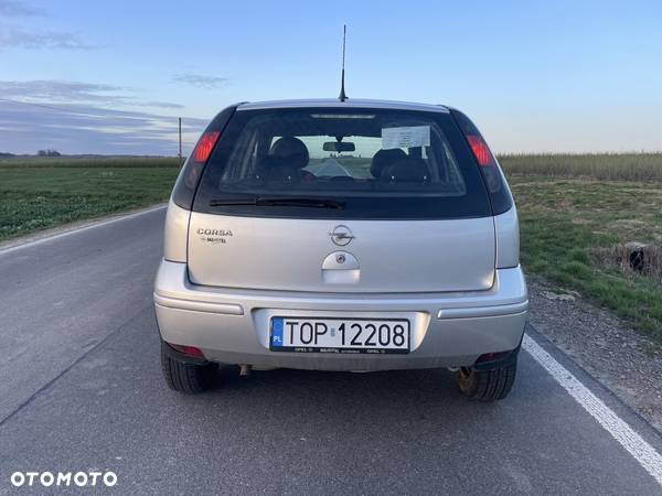 Opel Corsa 1.0 12V Cosmo - 5