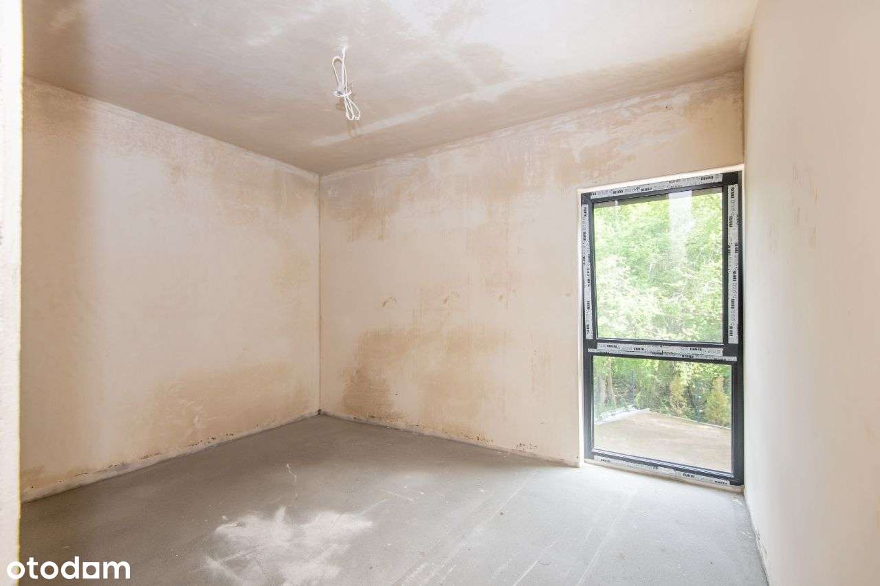 Bliźniak z wysoką piwnicą w Lusowie - dookoła LAS-18