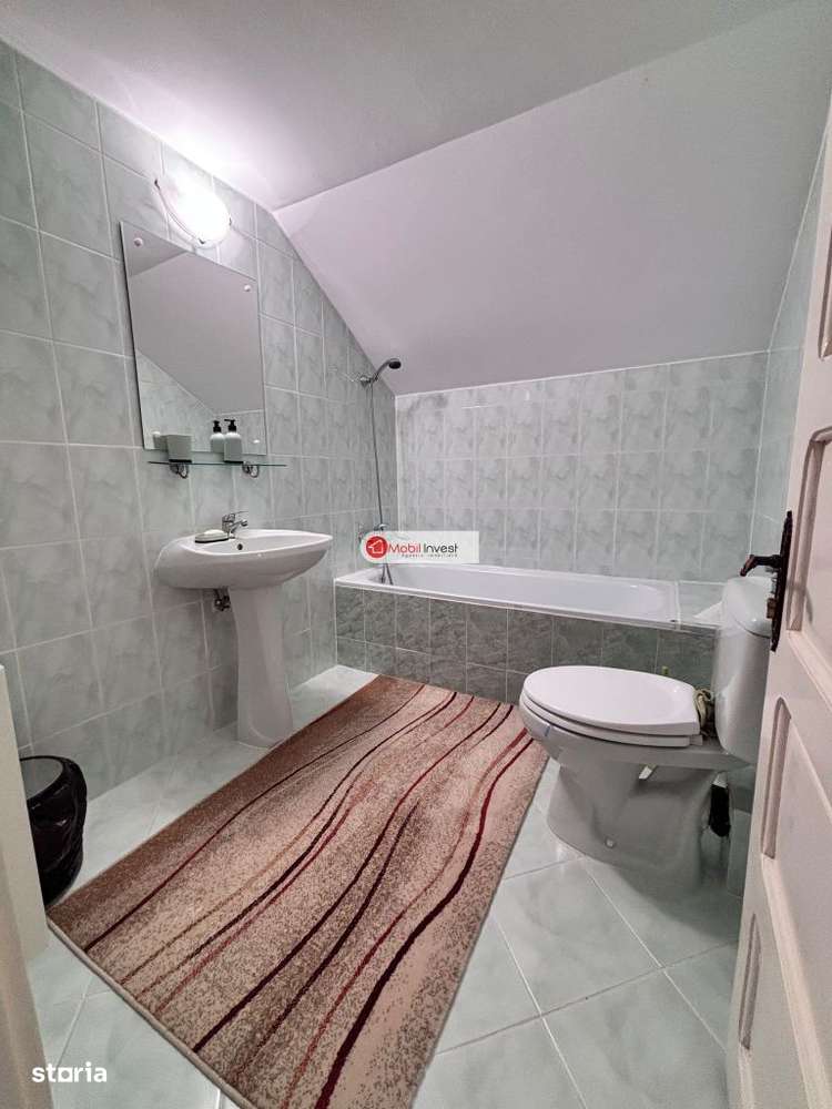 Casa tip duplex S+P+M,cu garaj si teren de 462 mp,in centrul orasului!-8