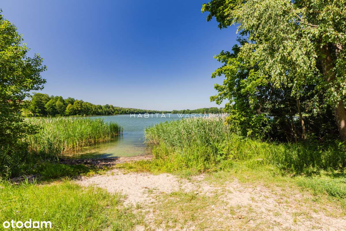 Dom z potencjałem w otoczeniu jeziora i lasu-12