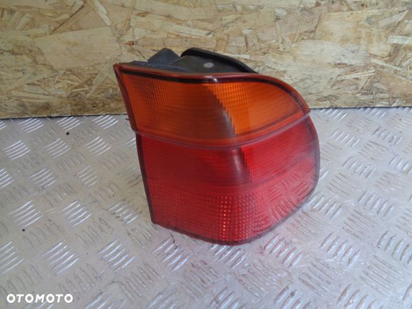 LAMPA PRAWY TYŁ W BŁOTNIK BMW E39 KOMBI 95- - 1