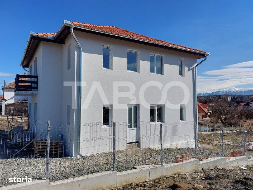 Casa individuala pentru 2 familii 6 camere 720 mp curte Cisnadie