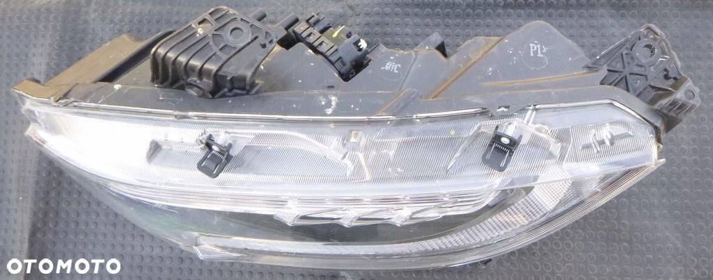 Honda Civic Reflektor Lewy 100-18659 - 2