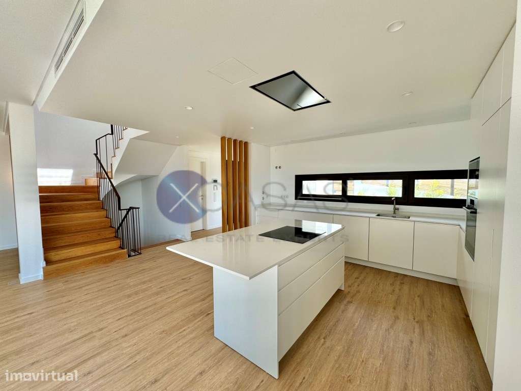 Moradia T3, nova a estrear, situada em Murches.-7