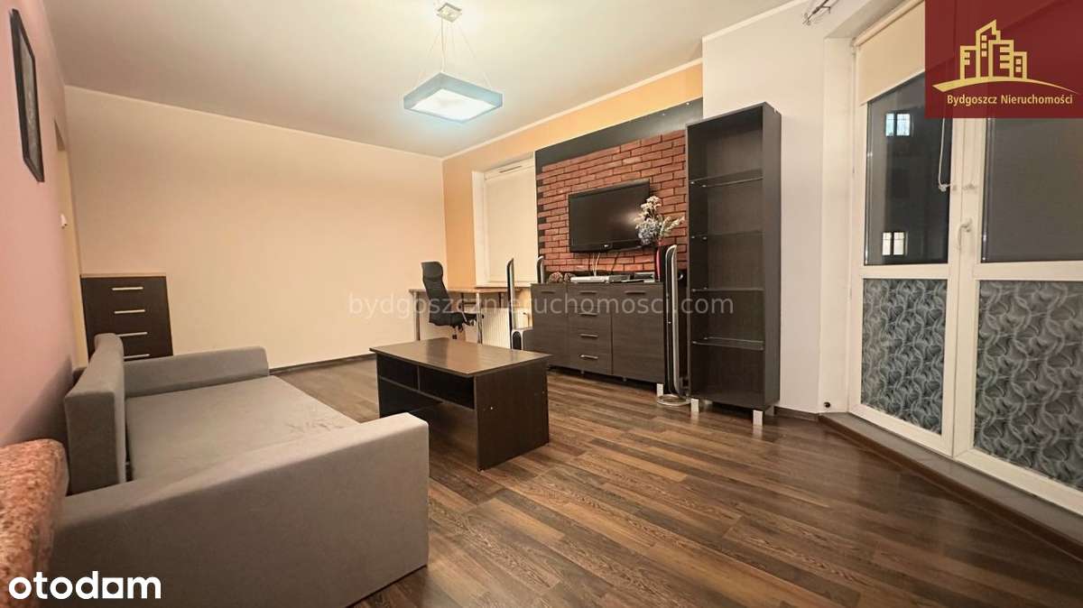 Przestronne M2  z widokiem na panoramę miasta.-0