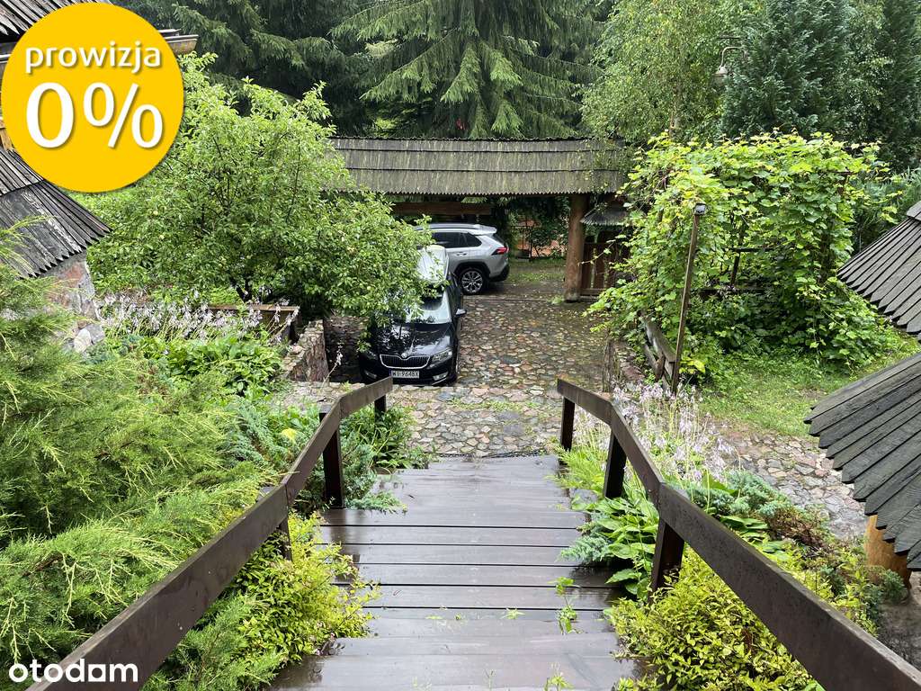 Podwójny dom z bala w enklawie ciszy i zieleni.-11