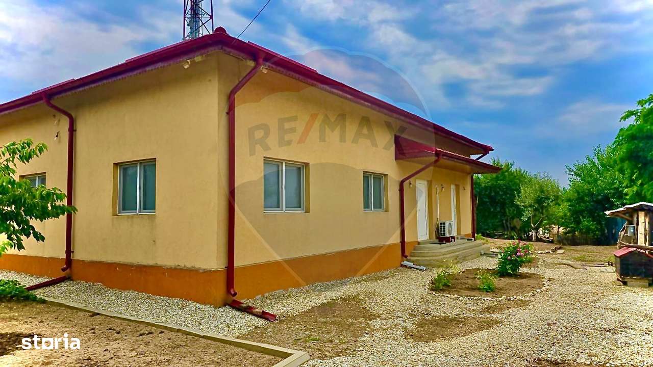 Casă Cu 4 Camere De Vanzare - Imagine principală: 1/8