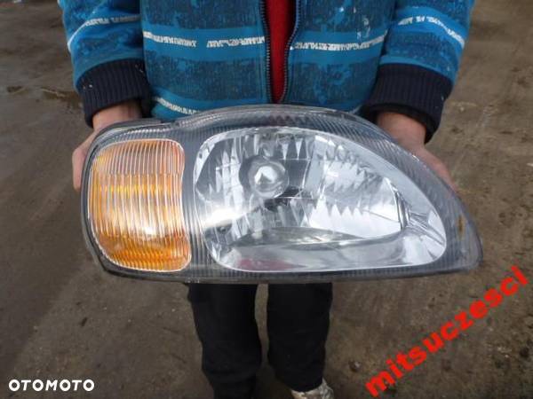 SUZUKI BALENO LIFT 99-07 LAMPA PRZEDNIA PRAWA - 1