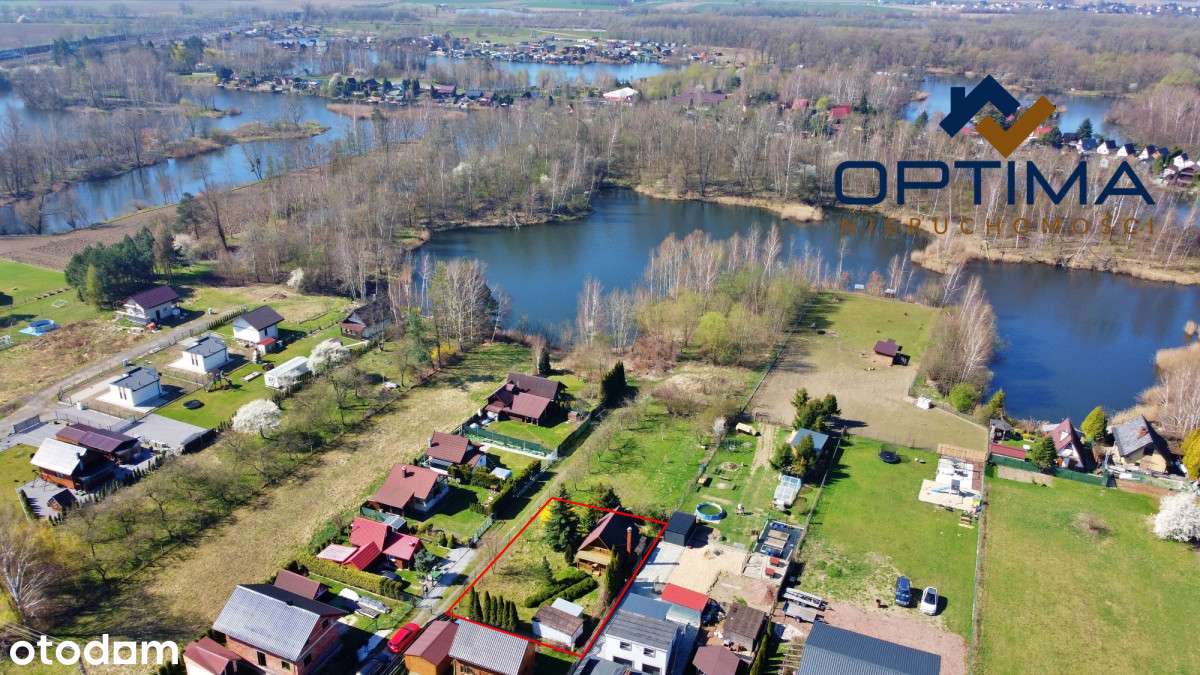 Domek w Olzie nad wodą - duża działka.-1