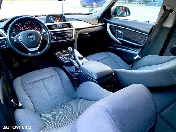 BMW Seria 3 320d Touring - 14