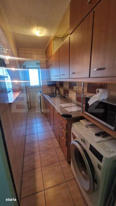 Garsoniera mobilata, etaj intermediar, parcare, beci luminoasa - Imagine principală: 1/13