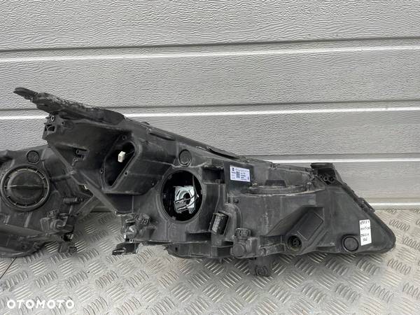 OPEL ASTRA V K LAMPA PRZÓD LEWA PRAWA LED 39111143 39158006 - 8