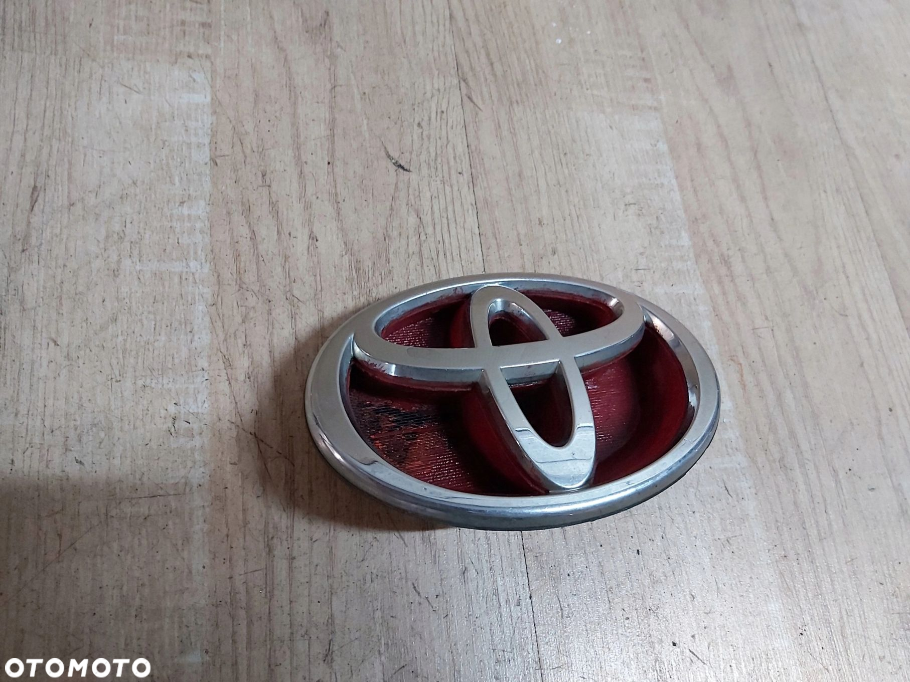 Toyota Corolla E12 1,8 TS znaczek emblemat przód logo 75311-02130 - 2
