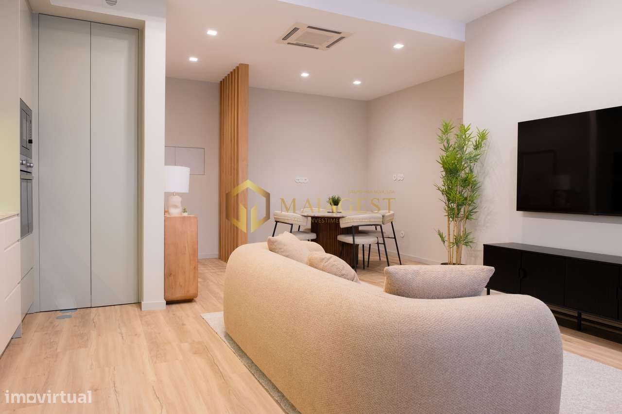 Elegância e Conforto: T2 Remodelado e Totalmente Equipado - Grande imagem: 5/35