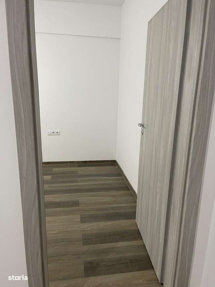 Apartament 2 cam dec, bucatarie separata etaj 1 cu parcare subterana-9