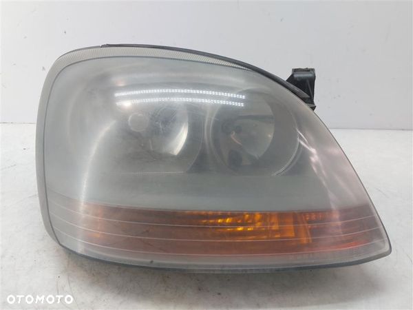 Reflektor lampa przód prawa Nissan Almera Tino 02R - 1