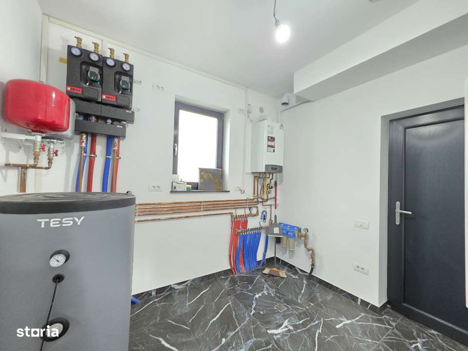 Casa individuala cu patru camere NZEB, teren 600mp, Halchiu-4