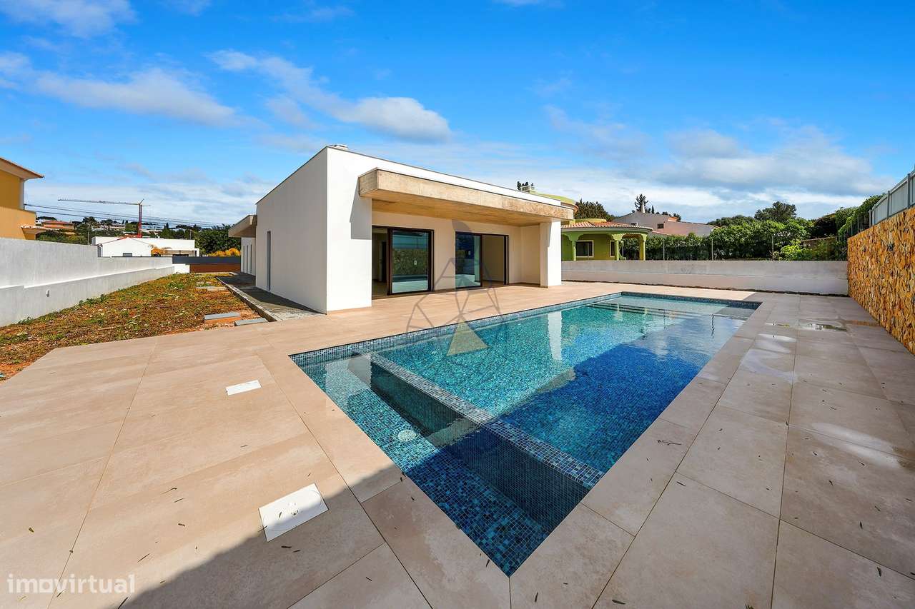Moradia contemporânea térrea T3 nova  com piscina em Monte Canelas - P - Grande imagem: 1/47
