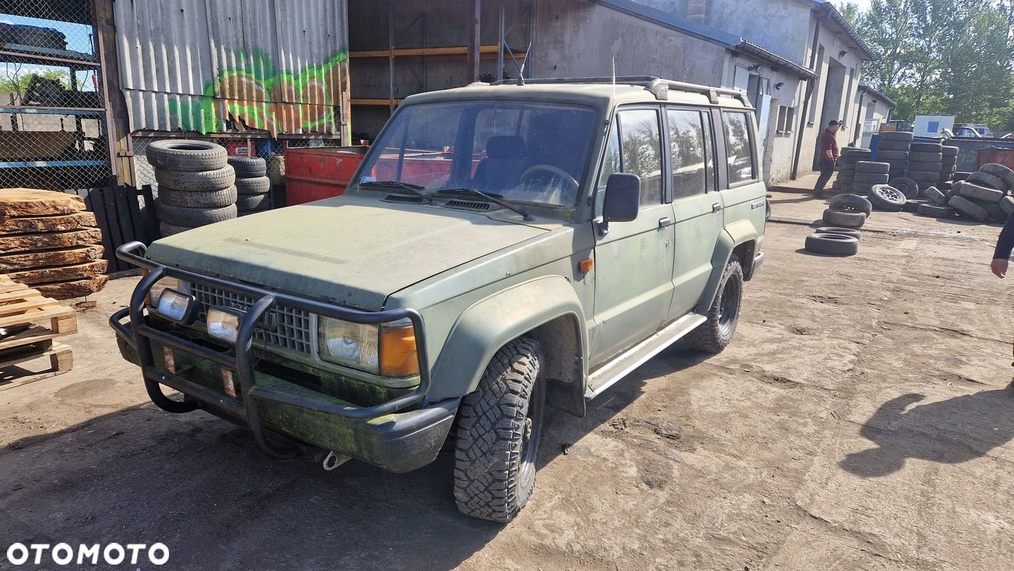 GOODYEAR WRANGLER 235/75R16 OPONA OPONY KOŁA ISUZU TROOPER - 1