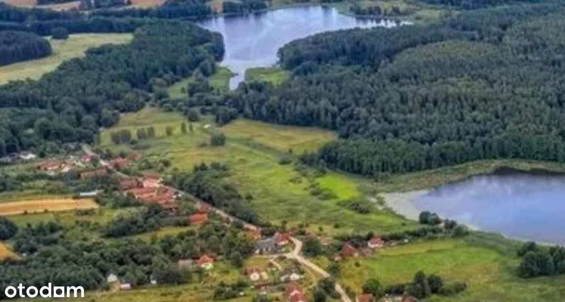Bezpośrednio sprzedam malowniczą działkę- przy jeziorze , mazury
