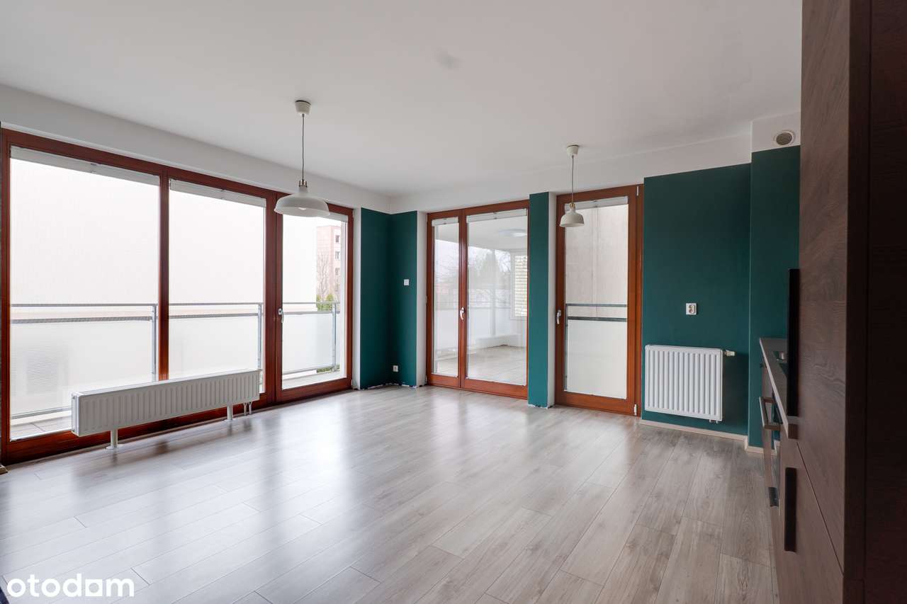 Mieszkanie z zadaszonym tarasem, klimatyzacją oraz miejscem postojowym-1