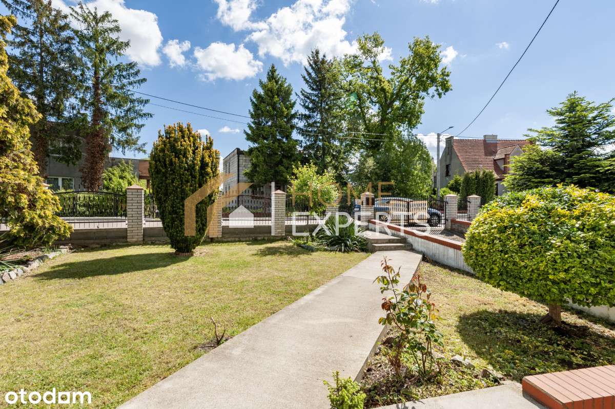 Piękny dom z dwoma garażami i pięknym ogrodem - Pełny obrazek: 2/20