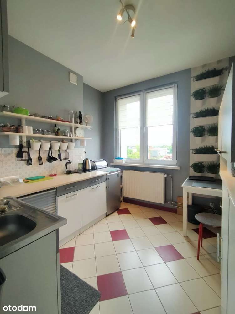 przestronna kawalerka w niskiej zabudowie-0