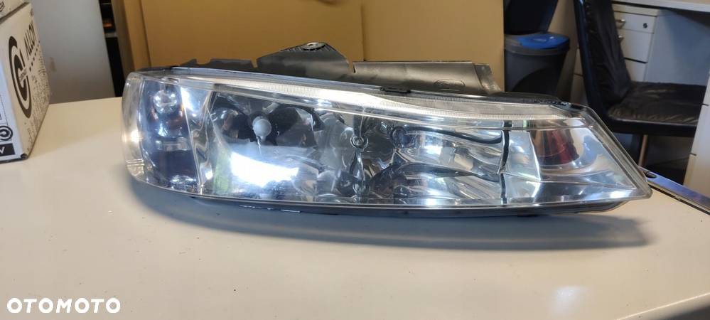 Reflektor Lampa Peugeot 406 Lift OE 0301175002 - 1