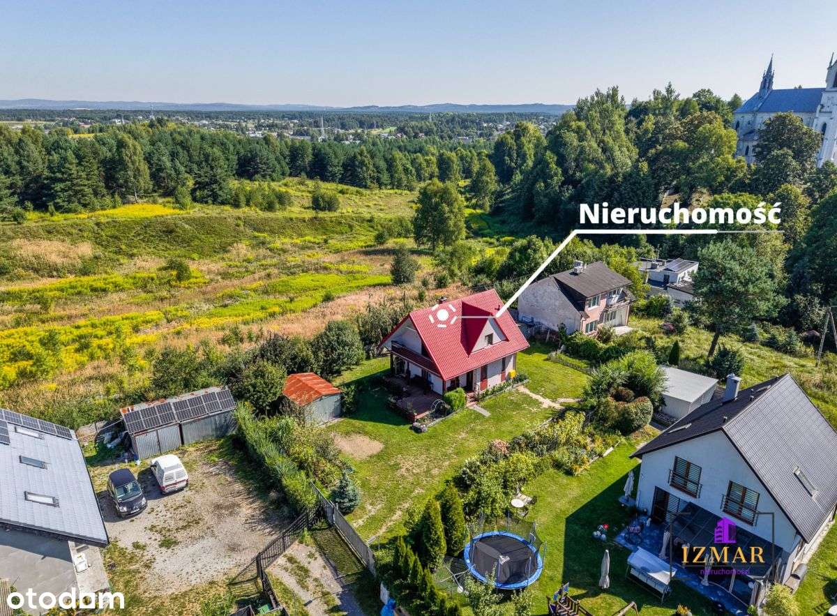 Funkcjonalny dom z 2 garażami i ogrodem-15