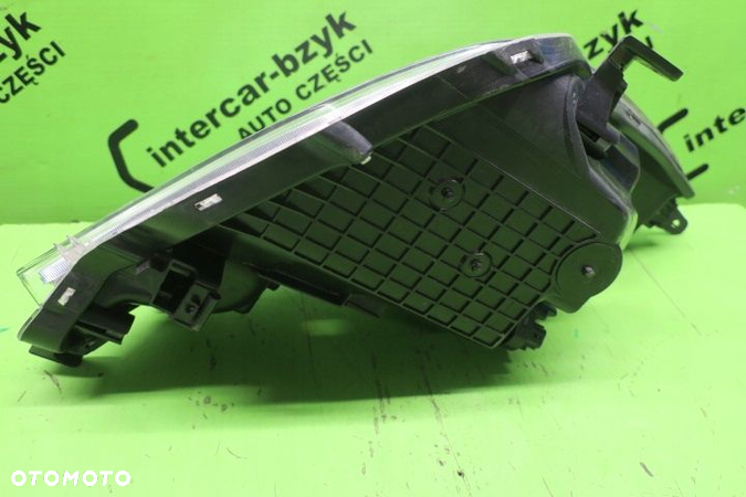 SUBARU TREZIA REFLEKTOR LEWY 2011 2012 2013 2014- - 7