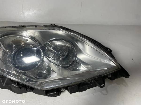 LAMPA PRAWA PRAWY PRZÓD PRZEDNIA XENON LAGUNA III 260100035R 2008- - 2