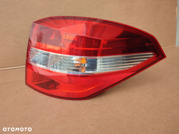 Lampa prawy tył RENAULT LAGUNA III KOMBI EUROPA ORYGINAŁ 265500002R - 1