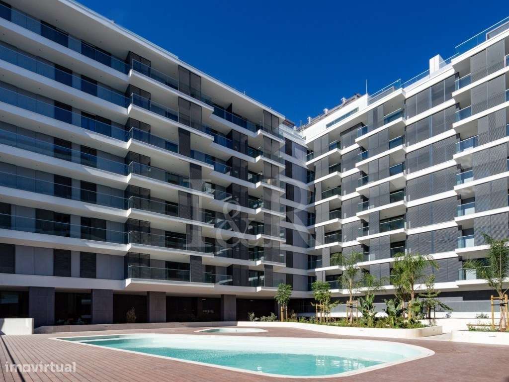 Apartamento T1 em condomínio com piscina nas Avenidas Novas - Grande imagem: 2/22