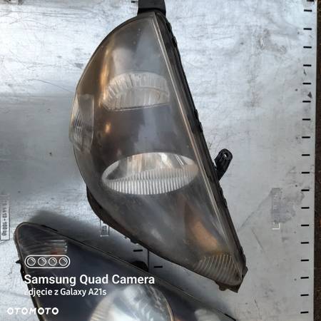 HONDA,JAZZ,(lift) (05-08).LAMPA PRZEDNIA (z wypustkami) - 2