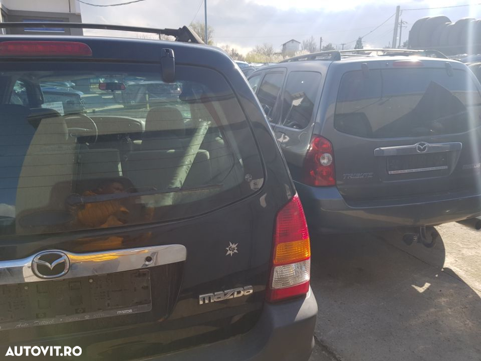 Dezmembrez mazda tribute 2.0 si 2.3 benzina manual - 4