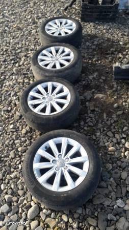 Set jante originale Audi A3 pe 16'' cu anvelope. - 5