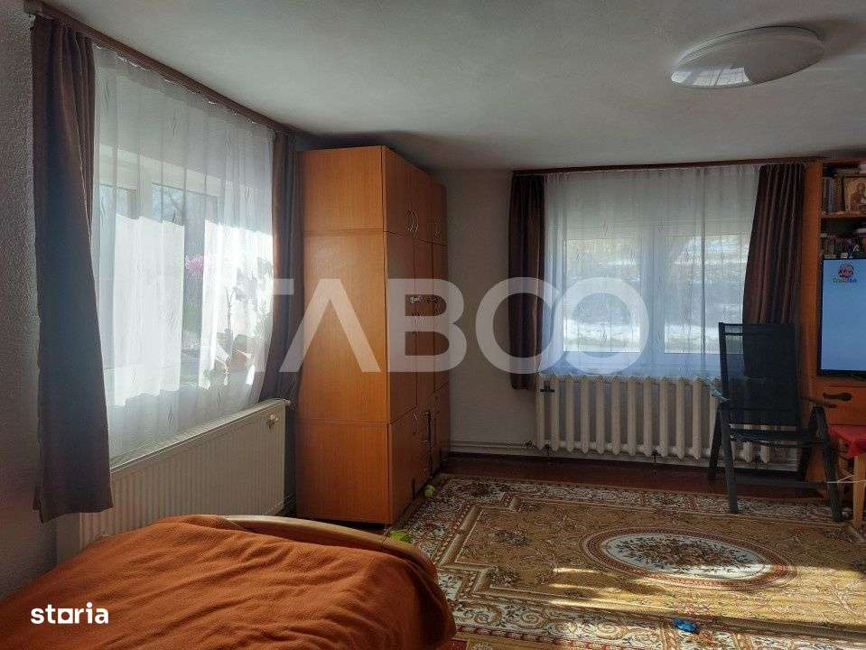 Casa individuala 2 camere 58 mpu curte si gradina 332 mp Cisnadie - Imagine principală: 4/15