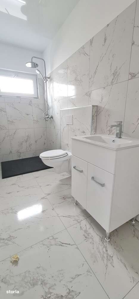 Casa 4 camere un nivel finalizata intabulata cartier Izvor Tarlungeni-12