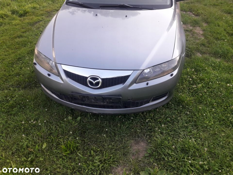 Mazda 6 02-07 Maska lampa zderzak pas atrapa 29Y - 3